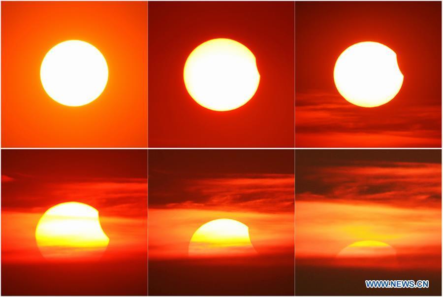 Combination photo taken on Aug. 11, 2018 shows the process of a partial solar eclipse in Changzhou City, east China\'s Jiangsu Province. (Xinhua/Chen Wei)