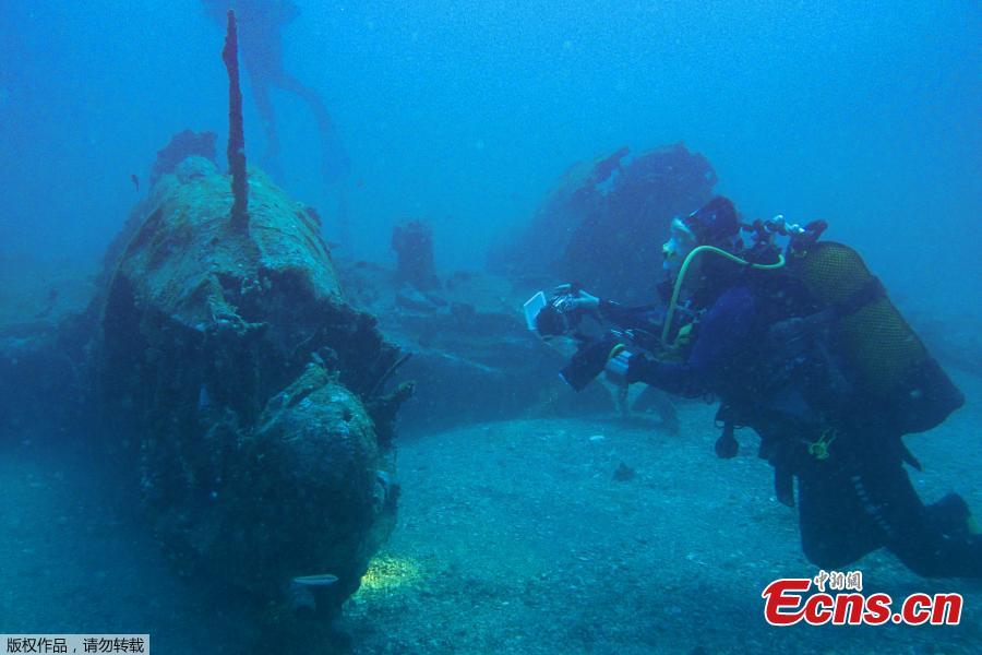A diver explores the wreckage of an American bombardier fighter plane from the Second World War, the Lockheed P-38G Lightning, at 38 meters of depth, on August 12, 2018, off the coast of La Ciotat, southern France. (Photo/Agencies)