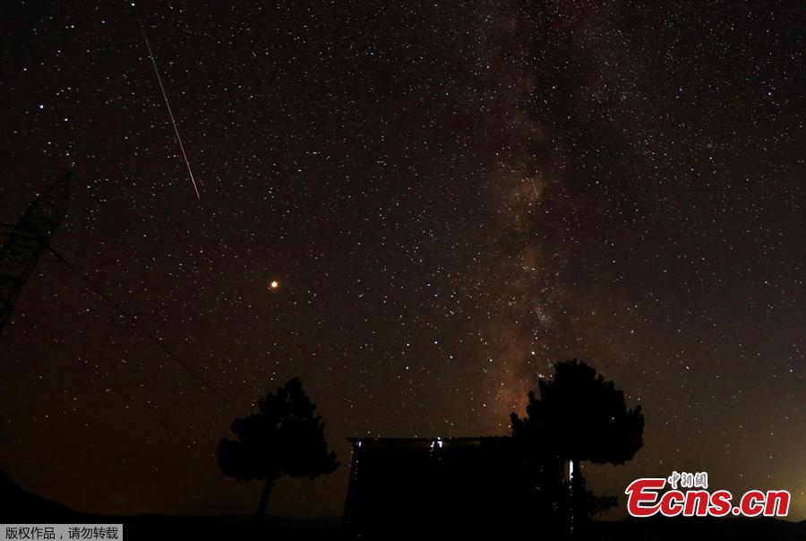 A meteor streaks over the skies over the milky way during the peak of Perseid meteor shower in Kozjak, Macedonia August 13, 2018. (Photo/Agencies)