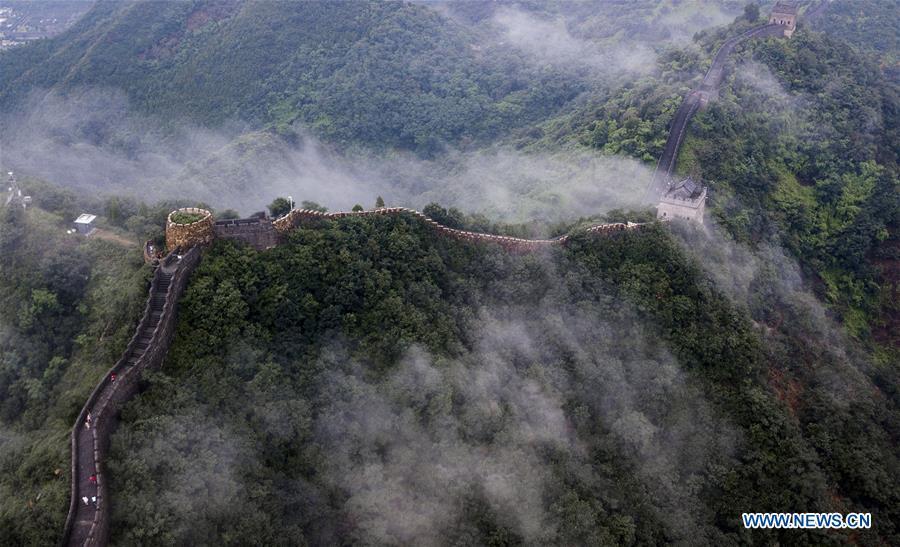 Photo taken on Aug. 13, 2018 shows cloud and fog after a rainfall at Huangyaguan section of the Great Wall in the Jizhou District of Tianjin, north China. (Xinhua/Wang Guangshan)