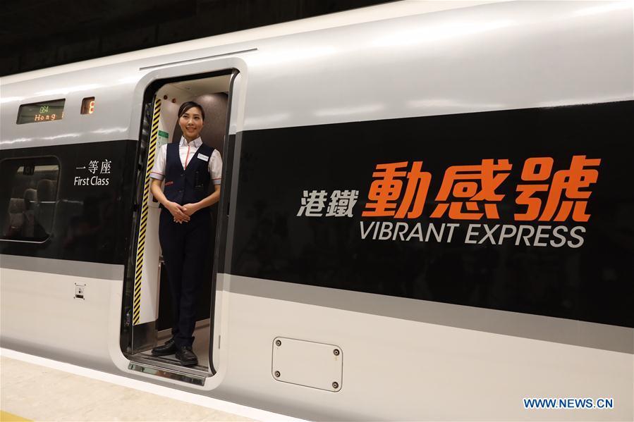 An attendant is seen on a train of the Guangzhou-Shenzhen-Hong Kong Express Rail Link (XRL), in Hong Kong, south China, Aug. 16, 2018. The trial run of the Hong Kong Section of XRL has been completed on Thursday. The 26-km Hong Kong section of the XRL links up Hong Kong with the mega high-speed rail network of the Chinese mainland. (Xinhua/Lui Siu Wai)
