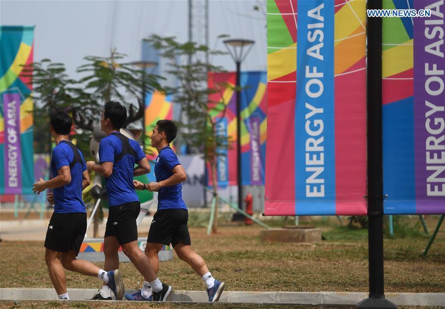Athletes jog at the Asian Games Village ahead of the 18th Asian Games in Jakarta, Indonesia, on Aug. 17, 2018. August 18 will witness the opening ceremony of the 18th Asian Games in Jakarta, Indonesia. (Xinhua/Huang Zongzhi)