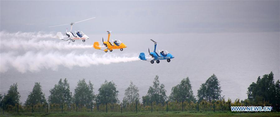 Photo taken on Aug. 18, 2018 shows an aerobatic flight performance during the opening ceremony of the 7th Faku Flight Conference in Shenyang, capital of northeast China\'s Liaoning Province. The flight conference kicked off here on Saturday. (Xinhua/Yao Jianfeng)