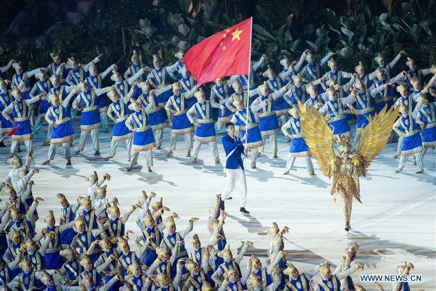 Delegation of China enters the Gelora Bung Karno (GBK) Main Stadium at the opening ceremony of the 18th Asian Games in Jakarta, Indonesia, Aug. 18, 2018.(Xinhua/Cheong Kam Ka)