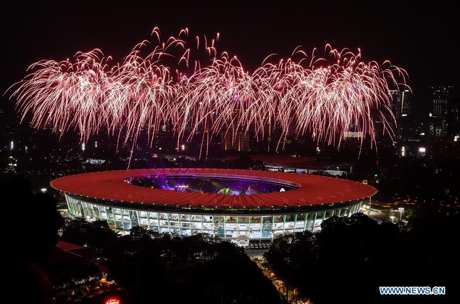Fireworks explode over the Gelora Bung Karno (GBK) Main Stadium at the opening ceremony of the 18th Asian Games in Jakarta, Indonesia, Aug. 18, 2018.(Xinhua/Li Xiang)