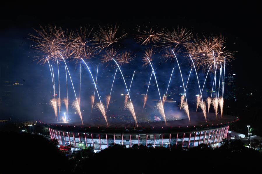 Fireworks explode over the Gelora Bung Karno (GBK) Main Stadium at the opening ceremony of the 18th Asian Games in Jakarta, Indonesia, Aug. 18, 2018.(Xinhua/Li Xiang)