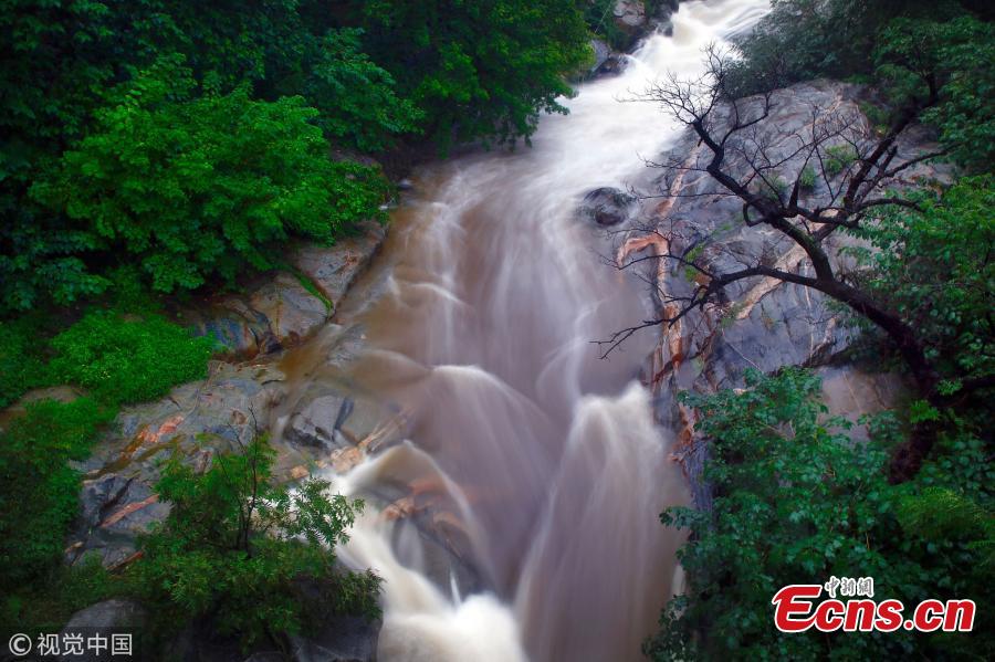 Days of rainfall have created amazing water landscapes on Mount Tai, a UNESCO World Heritage site known as the eastern mountain of the Five Great Mountains of China, attracting visitors keen to view the waterfalls and streams. (Photo/VCG)