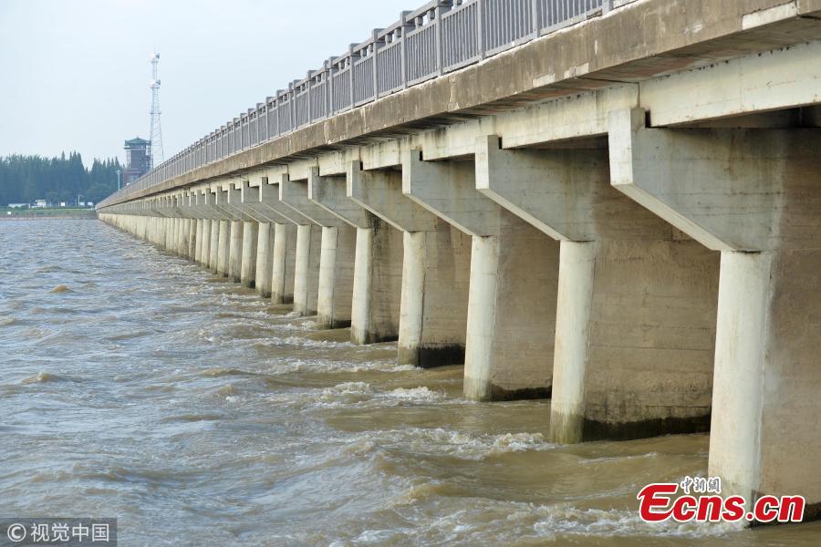 Water level rises in Hongze Lake following recent rainstorms in East China’s Jiangsu Province, Aug. 22, 2018. Local authorities said water level of several river channels exceeded alarm line.   (Photo/VCG)