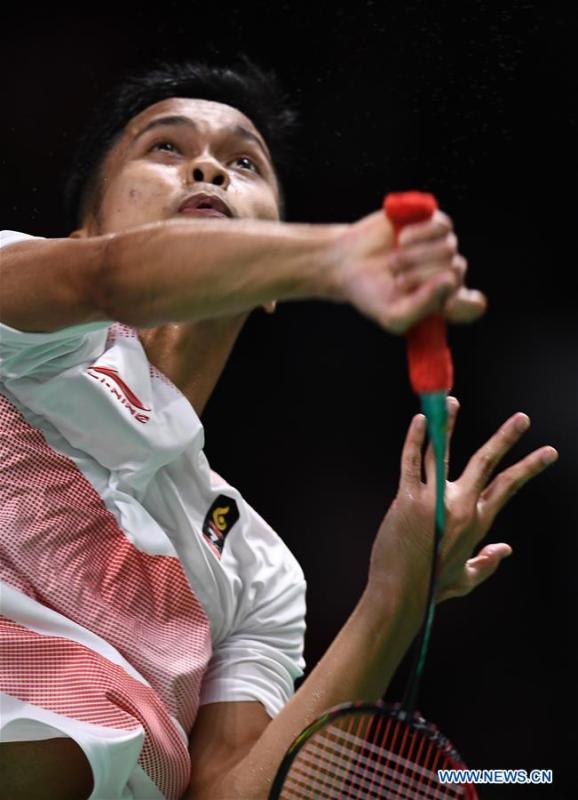 Indonesia\'s Anthony Sinisuka competes during the singles match of men\'s team final between China and Indonesia at the 18th Asian Games in Jakarta, Indonesia on Aug. 22, 2018. (Xinhua/Li Xiang)