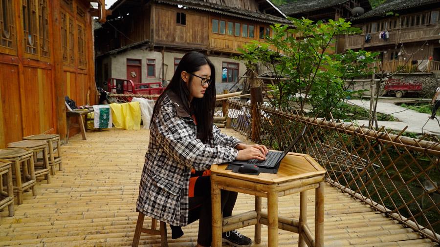 Xu Zhengxue, 28 (Photo provided to chinadaily.com.cn)
Xu Zhengxue was deeply attracted by the natural landscape of the 800-year-old Huanggang village when she visited it for the first time early this year.

When she heard the village was officially nominated to UNESCO to compete for recognition as a World Cultural Heritage Site in 2021, she decided to do something for the village.

The village of Qiandongnan Miao and Dong autonomous prefecture in Guizhou province is inhabited by the Dong ethnic group and it is one among those being slowly opened up for tourism.