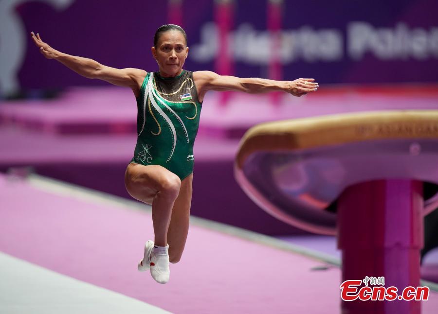 Uzbekistan\'s Oksana Chusovitina performs during the Artistic Gymnastics Women\'s Vault at the 2018 Asian Games in Jakarta, Indonesia, Aug.23, 2018. Chusovitina, 43 years old, won a silver medal in vault at the Asian Games. Chusovitina is a marvel of athletic longevity, with her international gymnastics career spanning nearly 30 years. (Photo: China News Service/Hou Yu)