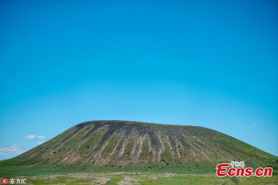 File photo of Ulan-hada Volcano Geopark in Chahar Right Rear Banner, North China’s Inner Mongolia Autonomous Region. The park, 380 kilometers from Beijing and known as a “museum” of natural volcanoes and lava landforms, has attracted an increasing number of tourists - at its most, 6,000 a day in 2018 - and local authorities are unable to cope with the strain these numbers place on the management of and environmental protection at the park. The park has recently closed. (Photo/IC)