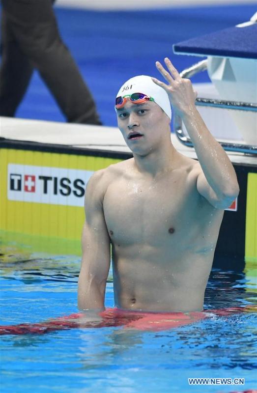 Sun Yang of China reacts after men\'s 1500m freestyle final of swimming at the 18th Asian Games in Jakarta, Indonesia, Aug. 24, 2018. Sun won the gold medal. (Xinhua/Yue Yuewei)