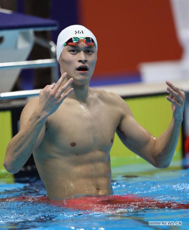 Sun Yang of China reacts after men\'s 1500m freestyle final of swimming at the 18th Asian Games in Jakarta, Indonesia, Aug. 24, 2018. Sun won the gold medal. (Xinhua/Fei Maohua)