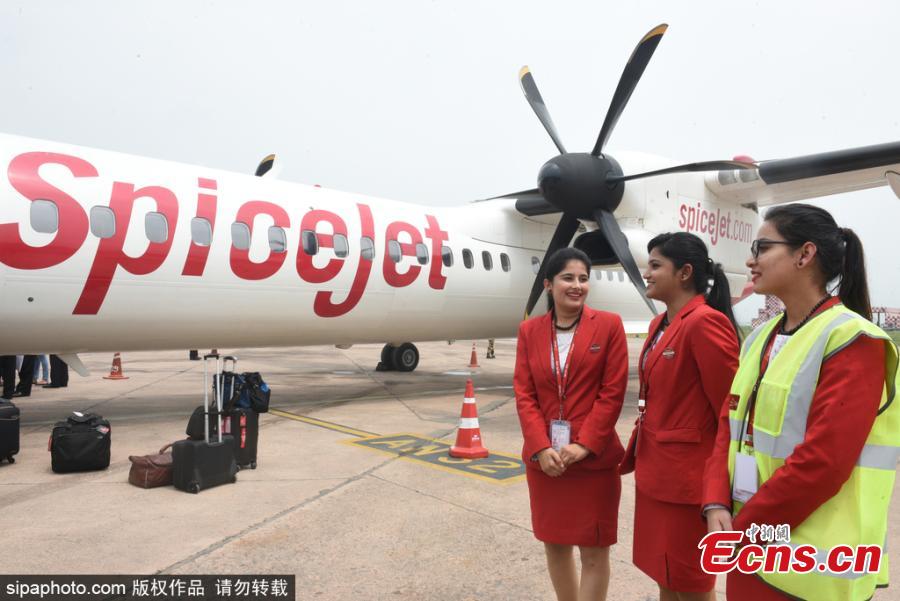 India\'s first biojet fuel aircraft, operated by SpiceJet, lands at Indira Gandhi International Airport in New Delhi, India, Aug. 27, 2018. The SpiceJet aircraft from Dehradun to Delhi had aviation regulator DGCA (Directorate General of Civil Aviation) officials along with other industry stakeholders on board, to ascertain the feasibility of biofuel-powered flights. (Photo/SipaPhoto)