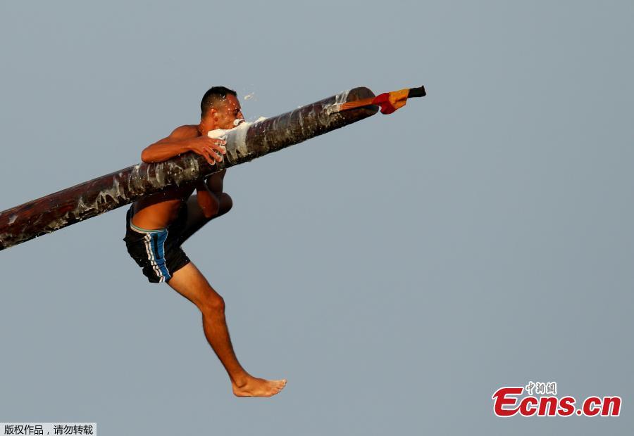 A competitor slips off the \