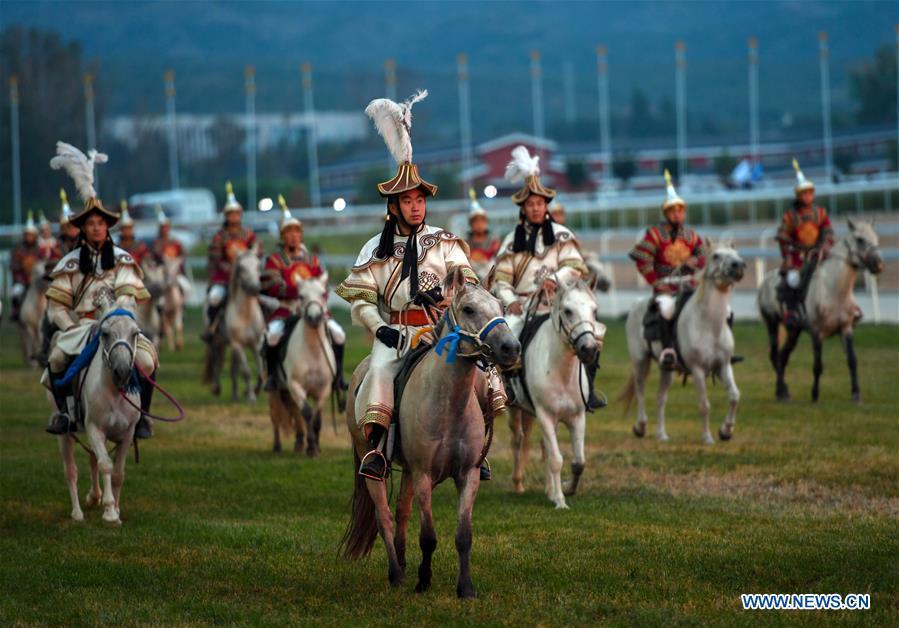 Equestrian performers attend the opening ceremony of a horse-themed art week in Hohhot, capital of north China\'s Inner Mongolia Autonomous Region, Aug. 27, 2018. Kicked off here on Monday, the art week will include art performances, beer and food festival, and equestrian performances. (Xinhua/Peng Yuan)