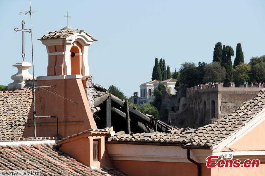 A part of the collapsed roof of the San Giuseppe dei Falegnami church is seen in Rome, Italy, Aug. 30, 2018. The church was closed to the public at the time and is normally open only for marriage ceremonies, but dogs were brought in to sniff through the rubble to make certain no one had been buried, the fire department said.  (Photo/Agencies)