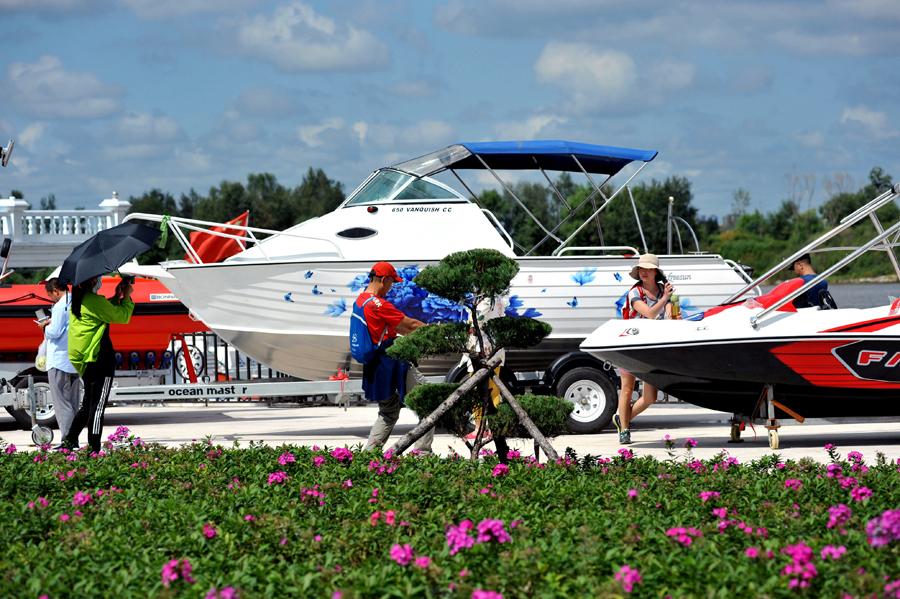 The second Harbin Yacht Exposition kicks off at Dejia Yacht Bay in Harbin, Heilongjiang province, on Aug 31, 2018.The five-day expo has attracted more than 150 companies to display their yachts, including some famous international brands.(Photo by Wang Zhenliang/For chinadaily.com.cn)