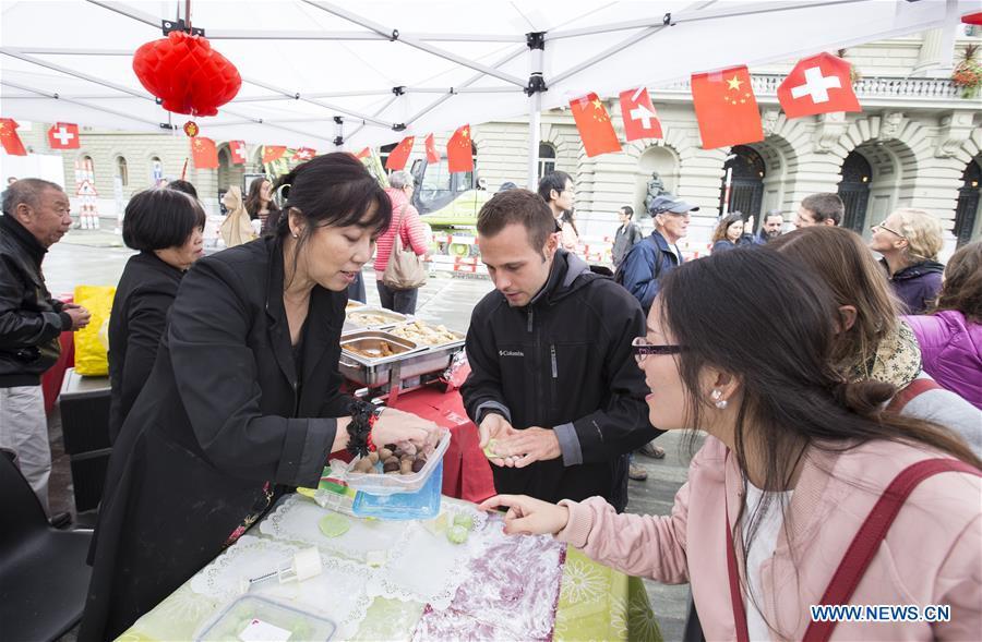 Visitors learn how to make mooncakes during the \