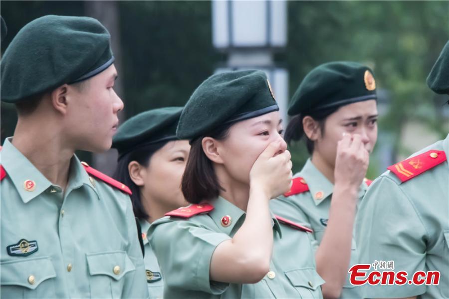 A ceremony is held for veterans who are leaving the armed police services in Gansu Province, Sept. 1, 2018. (Photo: China News Service/Zhang Xiaojun)