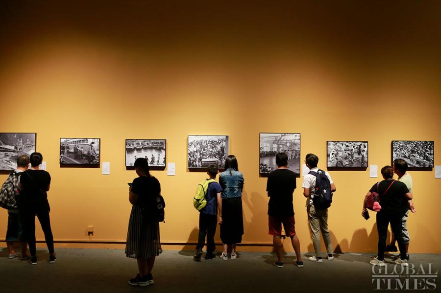 A photo exhibition called “Photographs at China: 40 Years through the Lens” kicked off at the National Museum of China in Beijing on August 30 to mark the 40th anniversary of China’s reform and opening-up. The exhibition will be open until September 12. (Photos: Li Hao/GT)
