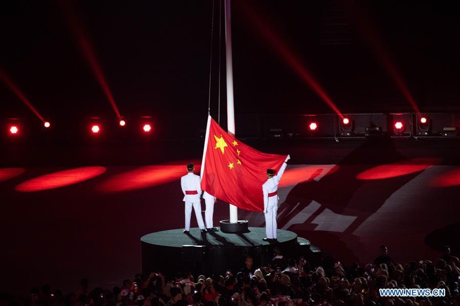 The national flag of China is raised during the closing ceremony of the 18th Asian Games at the Gelora Bung Karno (GBK) Main Stadium in Jakarta, Indonesia, Sept. 2, 2018.(Xinhua/Cheong Kam Ka)