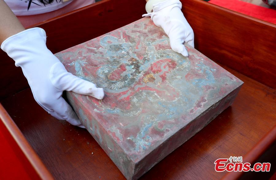 After preparing for two years, the research project into the restoration and conservation of The Hall of Mental Cultivation was launched on September 3, 2018 at the Palace Museum. Preparations began in December 2015, when collections inside the hall were labeled, recorded, restored and studied. The restoration work will cover 7,707 square meters, including 13 ancient buildings along with the doors and screen wall. (Photo: China News Service/Zhang Yu)