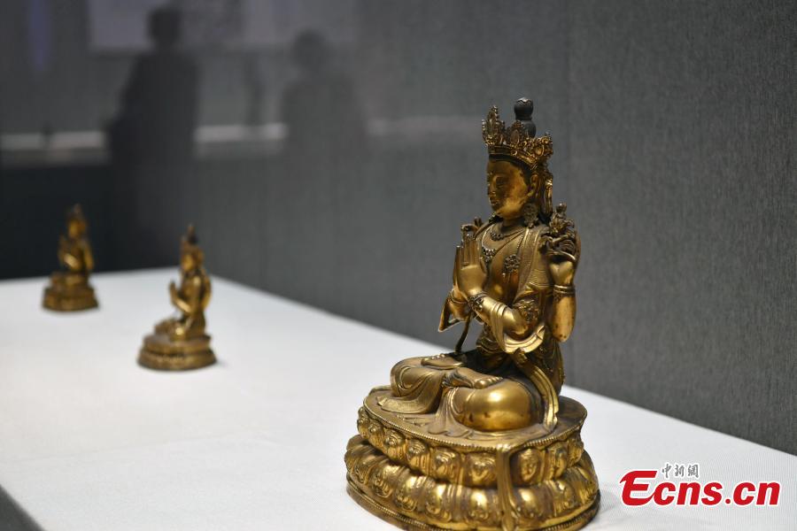 An exhibition of bronze Buddha statues opens in Shijiazhuang City, North China’s Hebei Province, Sept. 4, 2018. Hebei Provincial Museum displayed some 200 selected bronze Buddha statues made in the period from the Sixteen Kingdoms in the north (303?439) to the Qing Dynasty (1368-1644) to show the evolution of Buddhism and Buddha images in China. (Photo: China News Service/Zhai Yujia)