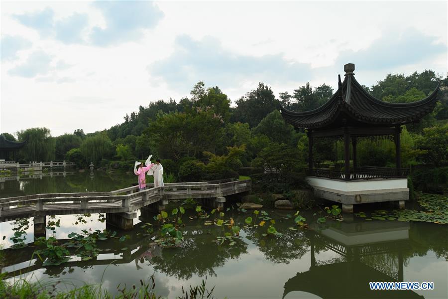 Wang Hongyuan (R) practices performing Yue opera with his classmate at Shengzhou Yue Opera art school in Shengzhou, east China\'s Zhejiang Province, Sept. 3, 2018. Wang Hongyuan, 17, was born in Taizhou of Zhejiang Province. He is the only male student who learns playing Xiaosheng (role of young man) in Yue Opera at Shengzhou Yue Opera art school. Xiaosheng are usually played by female actresses in Yue Opera which is an old art form originated in Shengzhou and noted for its lyricism and sweet tunes in China. Wang Hongyuan was granted special admission on account of his talent and resolve when he was at second grade in junior middle school. After hard practices, he has already taken part in some performances. (Xinhua/Weng Xinyang)