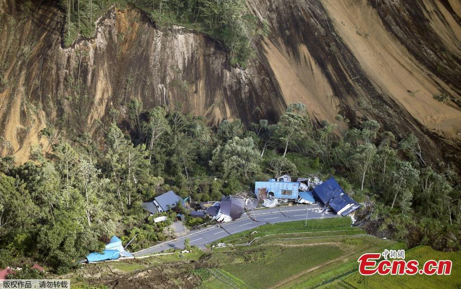 Houses damaged by a landslide caused by an earthquake, are seen in Atsuma town in Japan\'s northern island of Hokkaido, Japan, in this photo taken by Kyodo September 6, 2018.