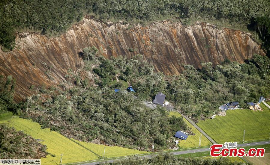 Houses damaged by a landslide caused by an earthquake, are seen in Atsuma town in Japan\'s northern island of Hokkaido, Japan, in this photo taken by Kyodo September 6, 2018. (Photo/Agencies)