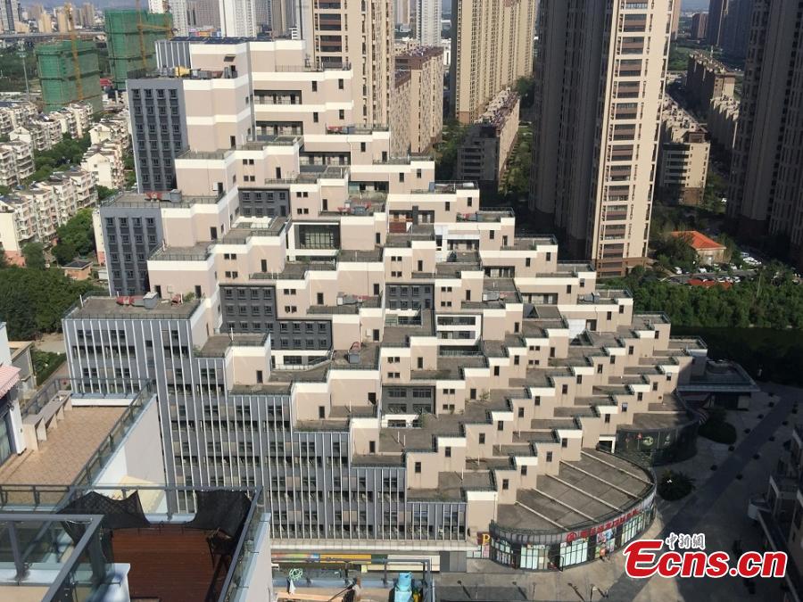 A building complex that looks like a pyramid in Kunshan City, East China’s Jiangsu Province, Sept. 5, 2018. Pictures of the complex, comprised of three buildings located on a mountain, went viral on the Internet due to its unique architectural appearance. The complex was put into use in 2013 and has a total floor area of 130,000 square meters. (Photo: China News Service/Huang Ying)