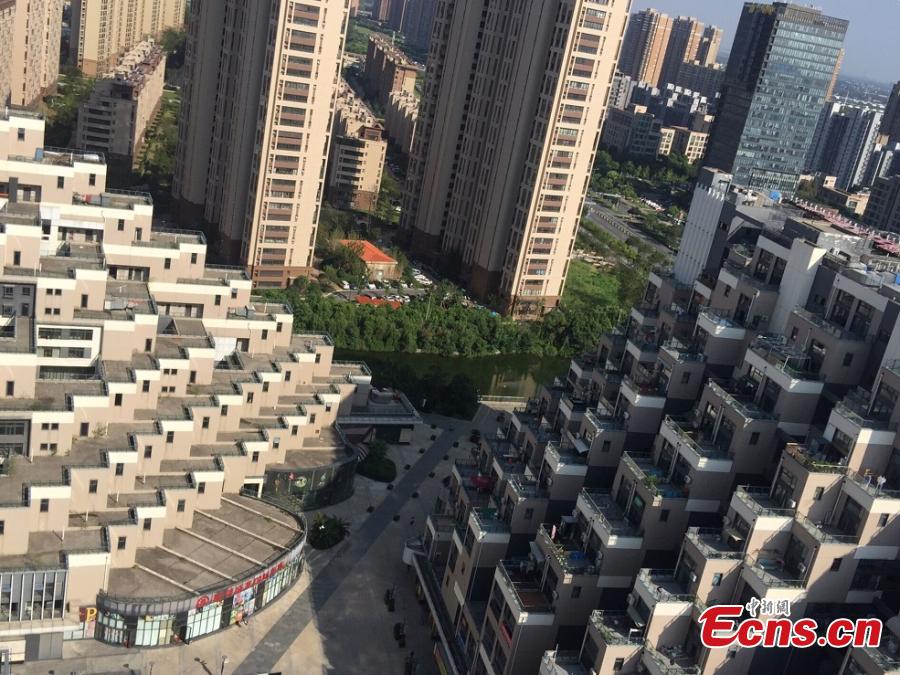A building complex that looks like a pyramid in Kunshan City, East China’s Jiangsu Province, Sept. 5, 2018. Pictures of the complex, comprised of three buildings located on a mountain, went viral on the Internet due to its unique architectural appearance. The complex was put into use in 2013 and has a total floor area of 130,000 square meters. (Photo: China News Service/Huang Ying)