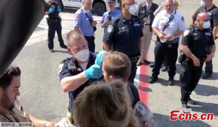Passengers are assisted by the air cabin crew and the emergency services on a flight from New York to Dubai, at JFK Airport, New York, U.S., September 05, 2018 in this still image obtained from a social media video.(Photo/Agencies)