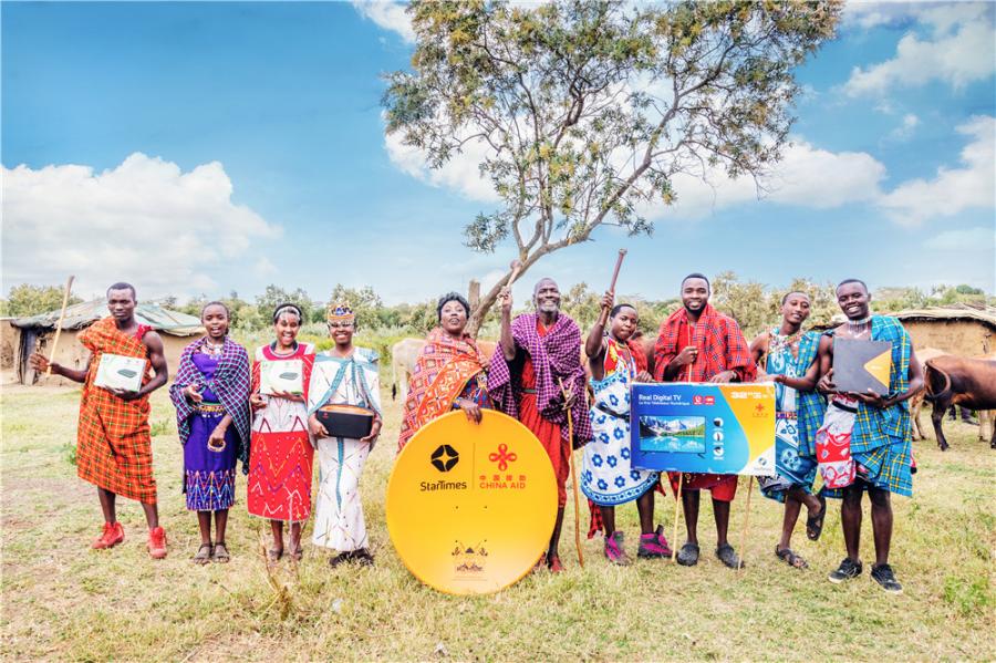 Residents take part in the Access to Satellite TV for 10,000 African Villages project in Suswa village, Narok county, Kenya, last month. (PHOTO PROVIDED TO CHINA DAILY)

A digital broadcaster is forging links of friendship between China and people in countries across the continent. 

Francis Tchiegue\'s busy Beijing life is becoming even busier due to what he calls his \