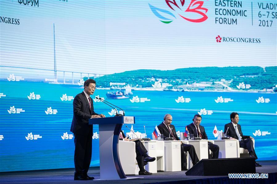 South Korean President Moon Jae-in (L) speaks on the plenary session of the third Eastern Economic Forum in Vladivostok, Russia, on Sept. 7, 2017. (Xinhua/Wu Zhuang)