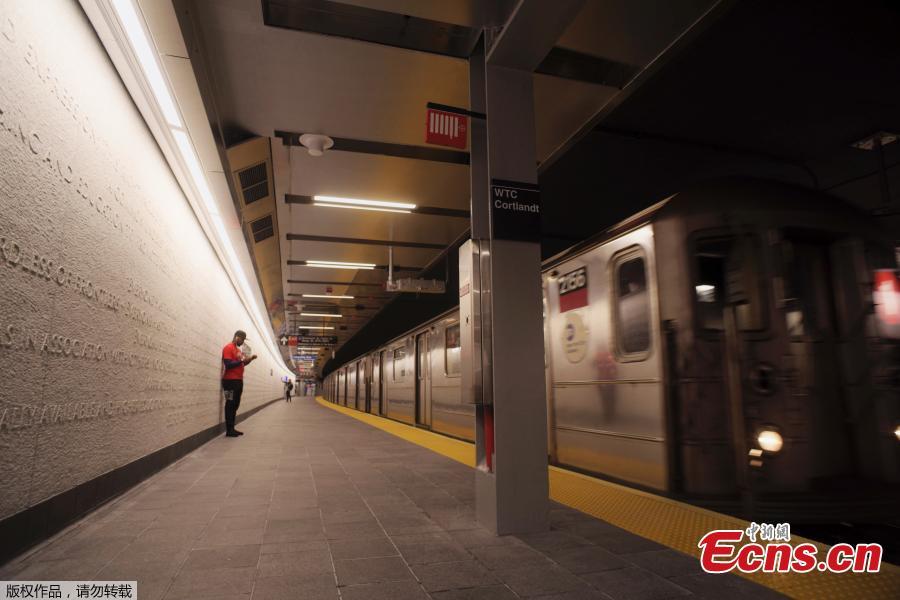A downtown 1 train pulls into the newly-opened WTC Cortlandt subway station in New York, Sept. 8, 2018. The old Cortlandt Street station on the subway system\'s No. 1 line was buried under the rubble of the World Trade Center\'s twin towers on Sept. 11, 2001. Construction of the new station was delayed until the rebuilding of the surrounding towers was well under way. The new station cost $181 million and features a mosaic that uses words from the Declaration of Independence. (Photo/Agencies)