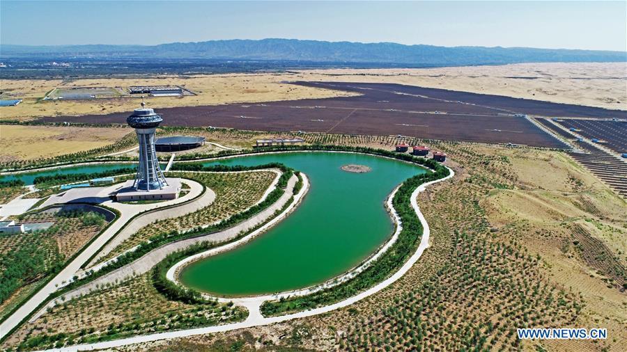Photo taken on Sept. 7, 2018 shows the photovoltaic industrial park in Zhongwei City, northwest China\'s Ningxia Hui Autonomous Region. To take advantage of abundant sunshine, Zhongwei has set up a photovoltaic power industry chain. (Xinhua/Wang Peng)