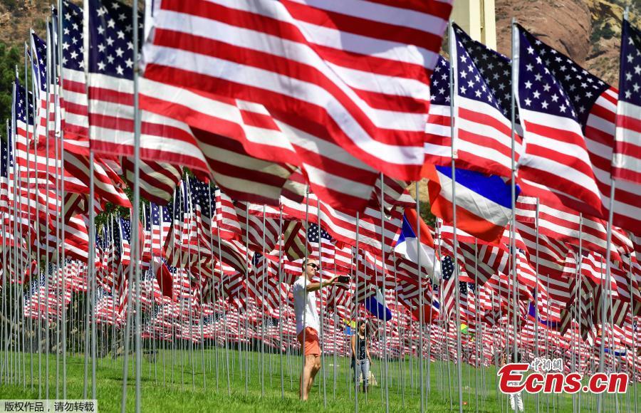 The Pepperdine University\'s annual display of flags honoring the victims of the 9/11 terrorist attacks, Sept. 10, 2018, in Malibu, California. Terrorists used hijacked planes to crash Sept. 11, 2001, into the World Trade Centers, the Pentagon and a field in Pennsylvania. The installation features a display of a total of 2,977 full-size flags—2,887 American flags for each American life lost and 90 various international flags representing the home countries of those from abroad who died in the 9/11 attacks. (Photo/Agencies)