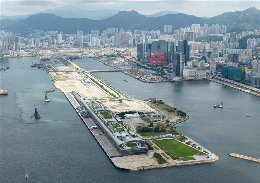 An aerial view of the Kai Tak Cruise Terminal. PHOTO PROVIDED TO CHINA DAILY
Challenges ahead

The Guangdong-Hong Kong-Macao Greater Bay Area will bring Chek Lap Kok unprecedented development opportunities. It also exposes the airport to a fiercely competitive market.

There are six airports in the Bay Area, the other five being Guangzhou Baiyun International Airport, Shenzhen International Airport, Zhuhai Airport and Foshan Shadi Airport in Guangdong, and Macao International Airport.

Research released in June last year found that Hong Kong was losing market share to its Bay Area counterparts on both international and domestic routes.

According to the Policy Research Institute of Global Supply Chain at Hang Seng Management College, the airports in Guangzhou and Shenzhen enjoyed 37 percent and 56 percent traffic growth respectively between 2011 and 2015.

The growth rates were far higher than the global average of less than 20 percent over the same four-year period. During this time, Hong Kong International Airport experienced traffic growth of 29 percent.

\