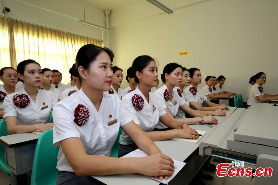 Train attendants receive extra training to prepare for the opening of the Guangzhou-Shenzhen-Hong Kong Express Rail Link in Fuzhou City, East China’s Fujian Province, Sept. 10, 2018. The XRL runs from a station in West Kowloon, heading north to the Shenzhen/Hong Kong Boundary, where it connects with the mainland section. Fuzhou and Xiamen, both cities in Fujian, will have direct high-speed services between Hong Kong’s West Kowloon station. The attendants undergoing training will serve on these trains. (Photo: China News Service/Li Yiming)