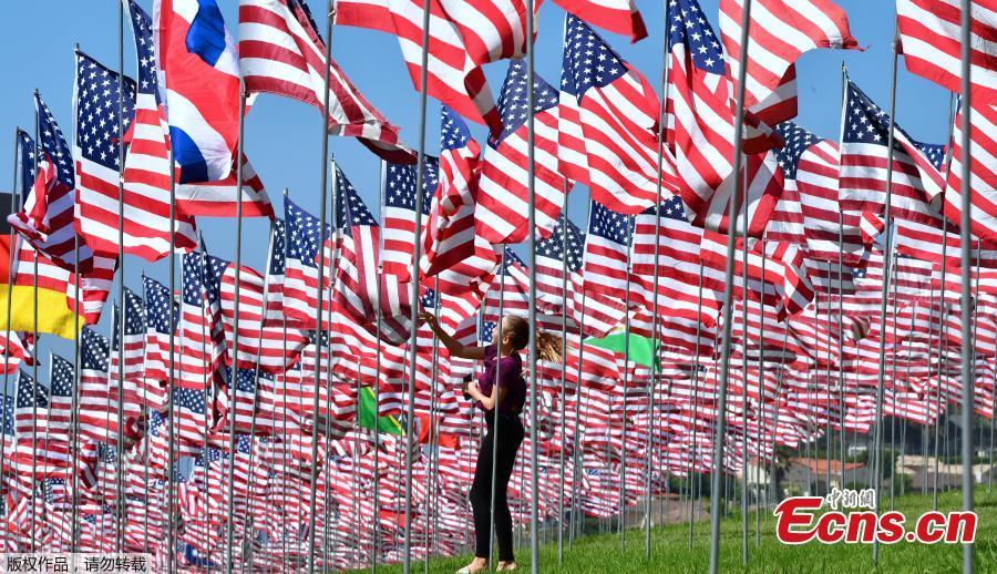 The Pepperdine University\'s annual display of flags honoring the victims of the 9/11 terrorist attacks, Sept. 10, 2018, in Malibu, California. Terrorists used hijacked planes to crash Sept. 11, 2001, into the World Trade Centers, the Pentagon and a field in Pennsylvania. The installation features a display of a total of 2,977 full-size flags—2,887 American flags for each American life lost and 90 various international flags representing the home countries of those from abroad who died in the 9/11 attacks. (Photo/Agencies)