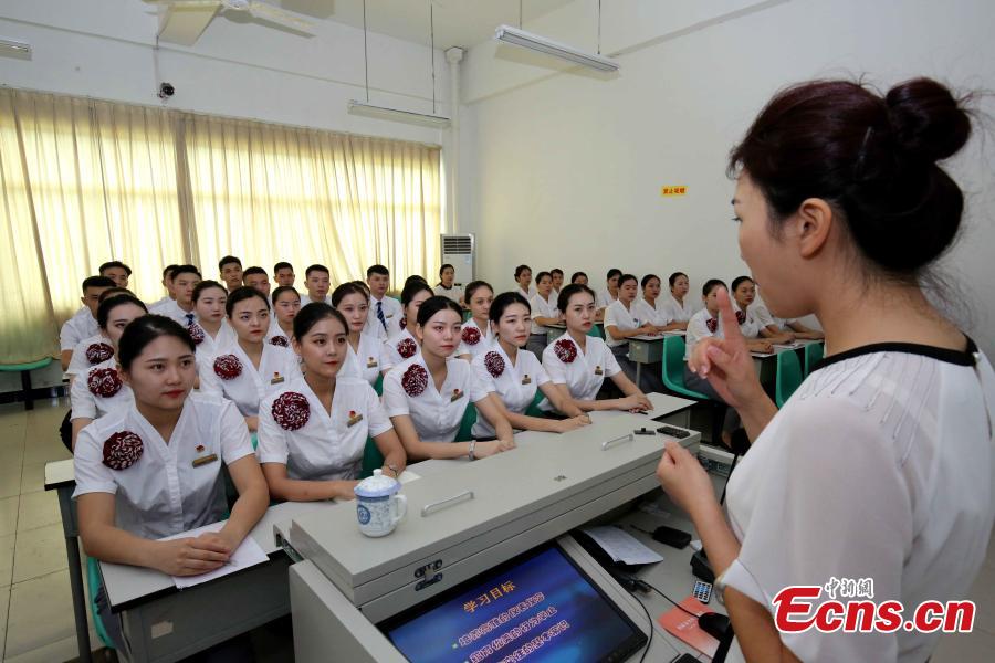 Train attendants receive extra training to prepare for the opening of the Guangzhou-Shenzhen-Hong Kong Express Rail Link in Fuzhou City, East China’s Fujian Province, Sept. 10, 2018. The XRL runs from a station in West Kowloon, heading north to the Shenzhen/Hong Kong Boundary, where it connects with the mainland section. Fuzhou and Xiamen, both cities in Fujian, will have direct high-speed services between Hong Kong’s West Kowloon station. The attendants undergoing training will serve on these trains. (Photo: China News Service/Li Yiming)