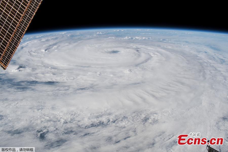 Hurricane Florence gains strength in the Atlantic Ocean as it moves west, seen from the International Space Station. Hurricane Florence, growing in size and intensity, crept closer to the U.S. East Coast on Wednesday as disaster mobilizations expanded south from the Carolinas into Georgia to counter the threat of fierce winds, deadly high seas and calamitous floods. (Photo/Agencies)