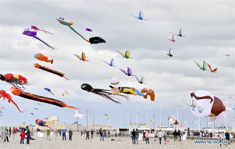 Kites fly over Dieppe, France, on Sept. 14, 2018. The 20th Dieppe International Kite Festival is held here from Sept. 8 to Sept. 16, attracting over 1,000 kite enthusiasts from 34 countries and regions. (Xinhua/Chen Yichen)