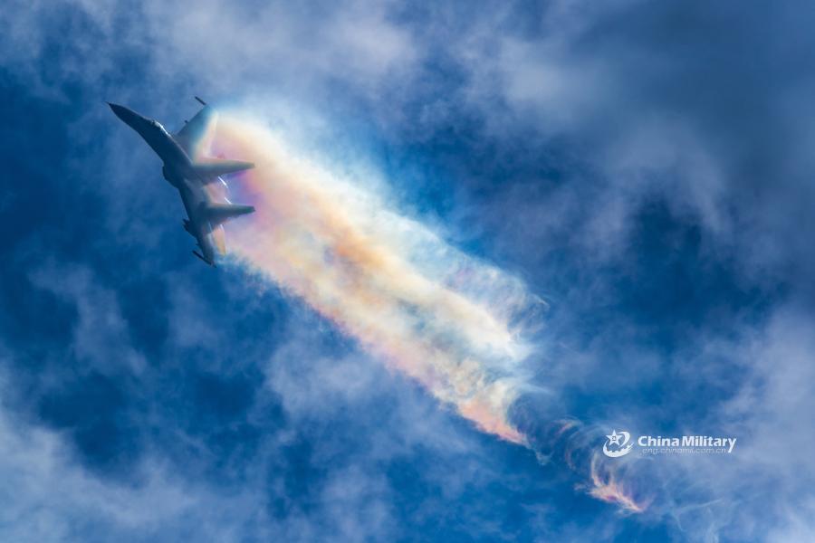 A J-11B fighter jet attached to an aviation brigade of the air force with the PLA Northern Theater Command performs the stiff pitch during a recent round-the-clock flight training exercise. (Photo/eng.chinamil.com.cn)