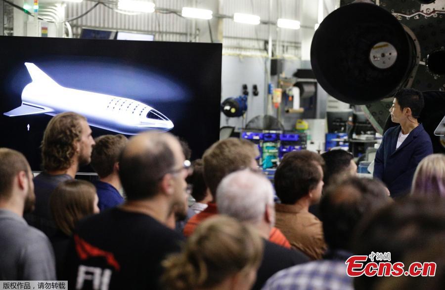Japanese billionaire Yusaku Maezawa, right, looks at a monitor showing the BFR spacecraft after SpaceX founder and chief executive Elon Musk announced him as the first scheduled private passenger on a trip around the moon, Sept. 17, 2018, in Hawthorne, Calif. SpaceX named its first private passenger as Japanese businessman Yusaku Maezawa, the founder and chief executive of online fashion retailer Zozo. (Photo/Agencies)