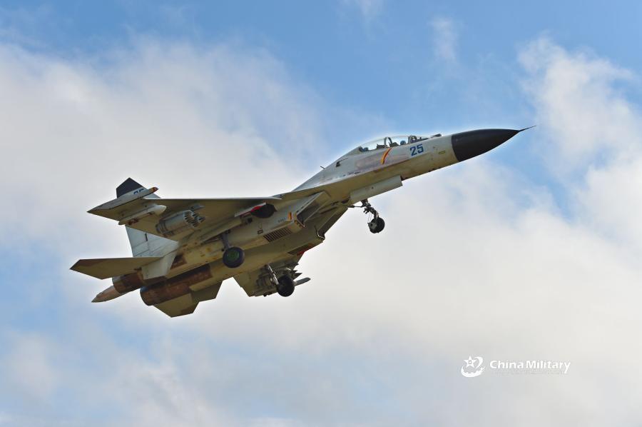 A J-11B fighter jet attached to an aviation brigade of the South China Sea Fleet under the PLA Navy takes off for a sortie during a live-fire flight training exercise near the South China Sea on September 19, 2018.  (Photo/eng.chinamil.com.cn)