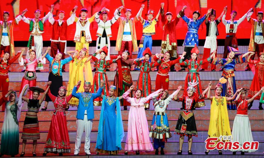 Performers sing at an evening gala to celebrate the 60th anniversary of the founding of the Ningxia Hui autonomous region in Yinchuan on Sept 19, 2018. (Photo: China News Service/ Du Yang)